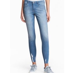 H&M Denim Skinny Ankle Jeans with ripped detail.